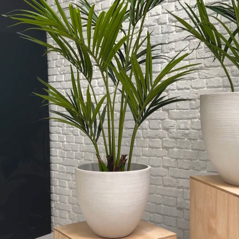indoor artificial palm tree in white pot
